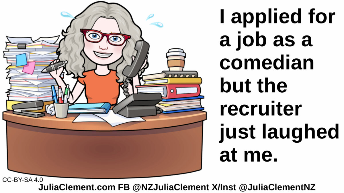 Julia sits at a cluttered desk, pen in one hand and phone in the other. Text: I applied for a job as a comedian but the recruiter just laughed at me.