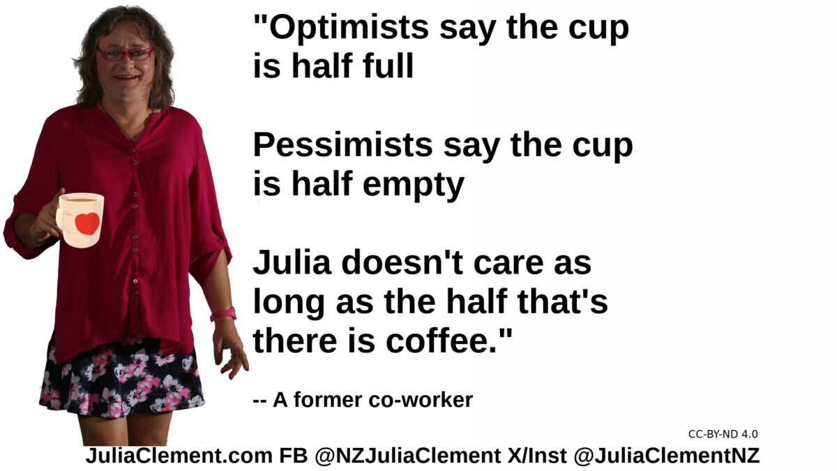 Julia holds a mug with a heart printed on it. Text: "Optimists say the cup is half full Pessimists say the cup is half empty. Julia doesn't care as long as the half that's there is coffee." -- a former co-worker