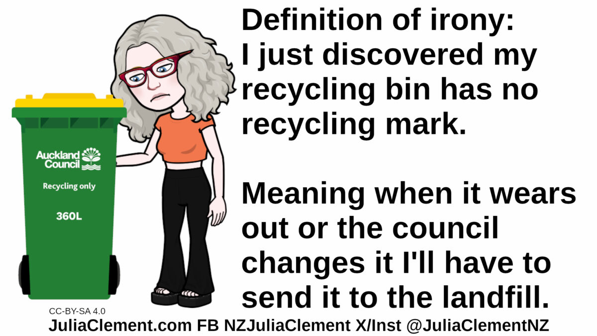 Julia sadly examines an Auckland Council recycling bin. Text: Definition of irony: I just discovered my recycling bin has no recycling mark. Meaning when it wears out or the council changes it I'll have to send it to the landfill.
