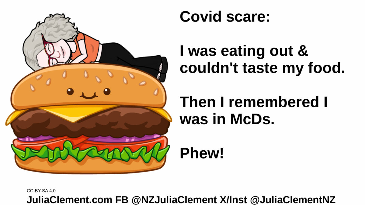 Julia lies on a giant cheeseburger. Text: Covid scare: I was eating out & couldn't taste my food. Then I remembered I was in McDs. Phew!